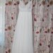Rochie de mireasa alba.